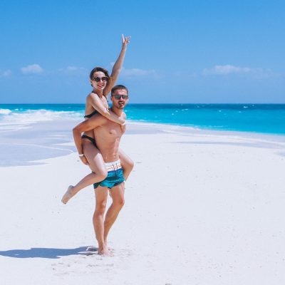 Couple happy together on a vacation by the ocean